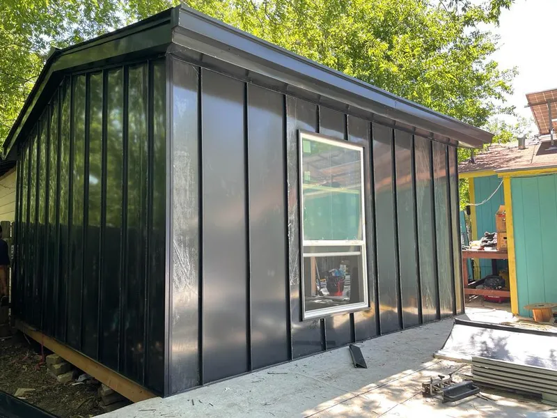 Black standing seam metal wall panels for Roof Inspection in Spout Springs